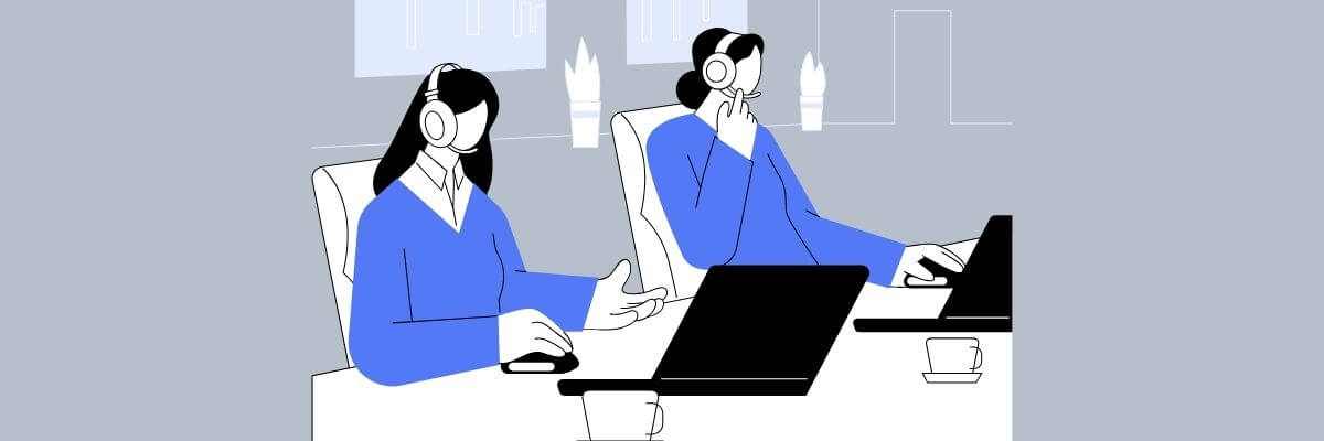 Minimalist illustration of two women sitting at desks with laptops, wearing headsets. One is typing and the other is gesturing while speaking, suggesting a customer service or call center setting. The background is light gray with faint outlines of office decor.