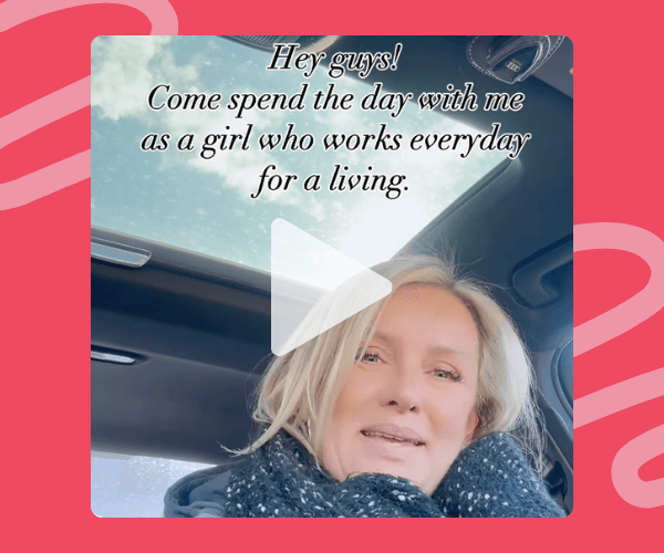 Screenshot of a video featuring a blonde woman sitting in a car with a sunroof, wearing a scarf, with text that says, “Hey guys! Come spend the day with me as a girl who works everyday for a living.” A play button icon is overlaid in the center.