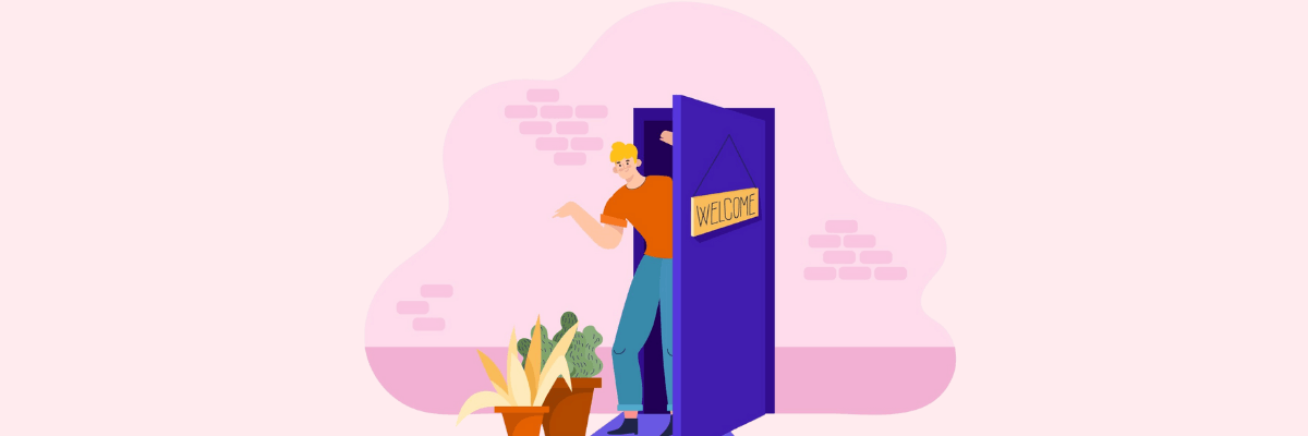 A person steps through a bright purple door with a “Welcome” sign, smiling as they enter a soft pink room decorated with potted plants.