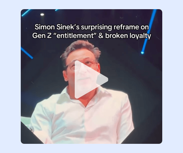 A man in a white shirt speaks on stage under blue spotlights, with text above that reads, “Simon Sinek’s surprising reframe on Gen Z ‘entitlement’ & broken loyalty.” The video appears to capture an insightful discussion or interview moment.