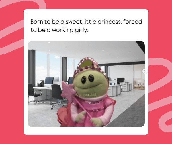 A sparkly pink princess-costumed frog puppet stands in the middle of a modern office, perfectly capturing the “born to be cute, forced to work” mood.