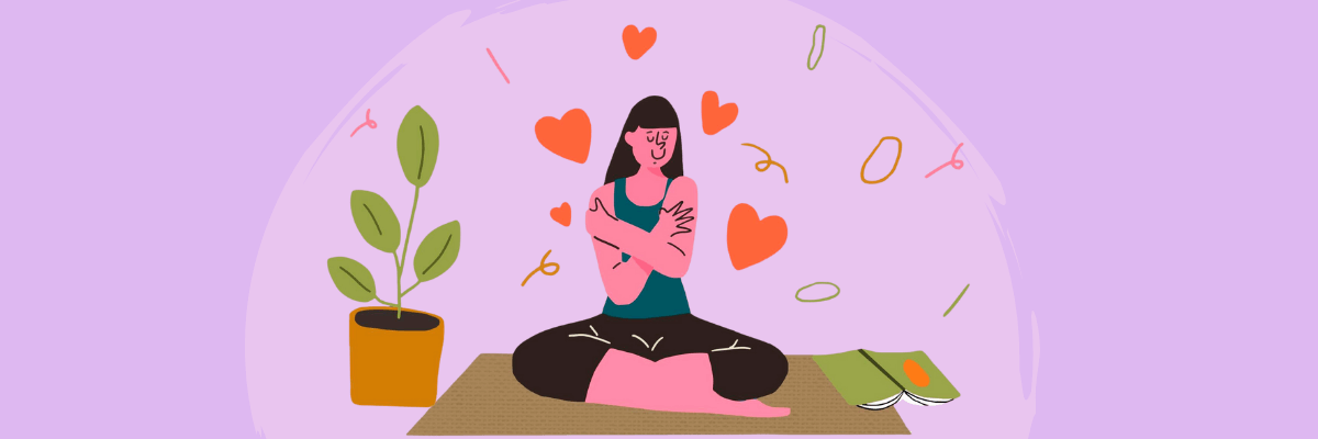A woman sits cross-legged on a yoga mat gently hugging herself with hearts floating around her. A potted plant and an open journal sit nearby, creating a peaceful self-care moment.