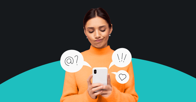 The image shows a woman in an orange sweater looking down at her phone, with speech bubbles around it containing the symbols “@?”, “!!”, and a heart icon. She stands against a dark background with a curved teal shape behind her.