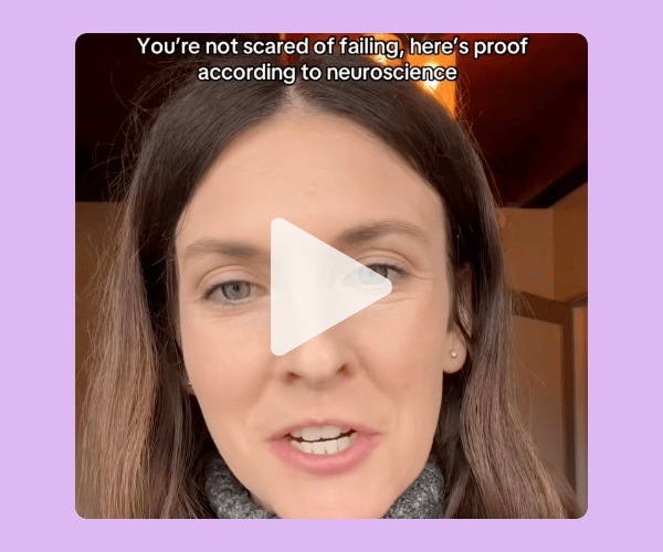 A woman speaks to the camera with on-screen text that reads, “You’re not scared of failing, here’s proof according to neuroscience.” It has that quick, educational TikTok vibe meant to shift your mindset.