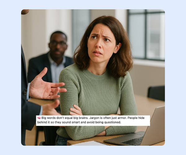 A woman in a green sweater sits with a confused, skeptical expression as someone gestures while talking, with a caption below about how “Big words don’t equal big brains” and jargon being used as armor. It perfectly captures that “what are you even saying?” work moment.