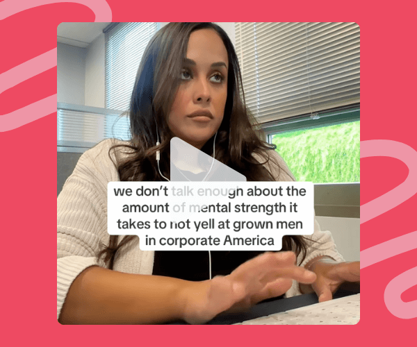 A woman in a cozy sweater sits at her desk typing, looking off to the side with that classic āholding it togetherā expression. On-screen text jokes about the mental strength it takes not to yell at grown men in corporate America.