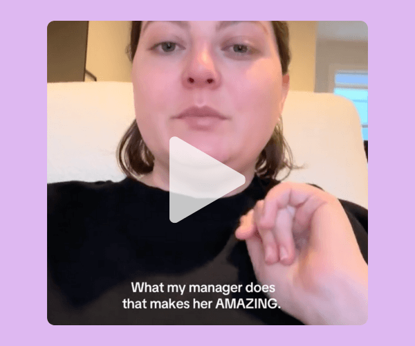 Screenshot from a casual selfie-style video of a woman speaking directly to the camera, with on-screen text that reads, āWhat my manager does that makes her AMAZING.ā with purple background..