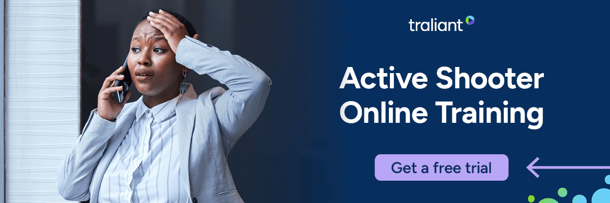 A worried woman in business attire holds a phone to her ear with one hand and her head with the other. Text beside her reads “Active Shooter Online Training” with a button that says “Get a free trial.”