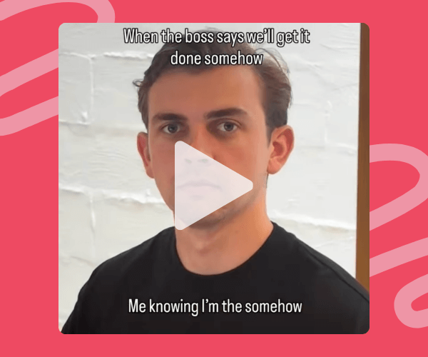 A meme-style video still of a man staring straight ahead with a concerned expression, overlaid with text joking about being the one responsible when a boss says a project will get done “somehow.”