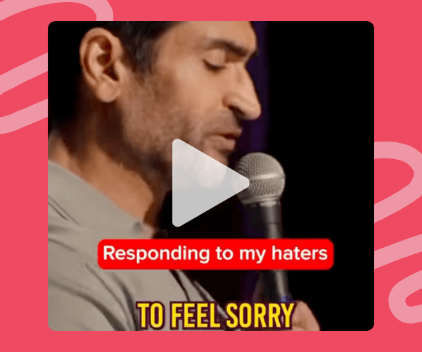 A man holds a microphone on stage with the caption “Responding to my haters” overlaid in bold red text. The background is dark, spotlighting his face in profile.