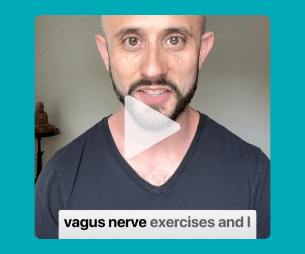 Close-up of a man speaking to camera in a video, with on-screen text that reads “vagus nerve exercises and I…,” suggesting he’s explaining a wellness or nervous system technique.