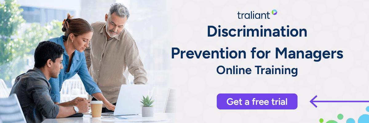 A workplace training ad shows three colleagues gathered around a laptop, collaborating in an office setting. Text on the right reads “Discrimination Prevention for Managers – Online Training” with a button inviting viewers to get a free trial.