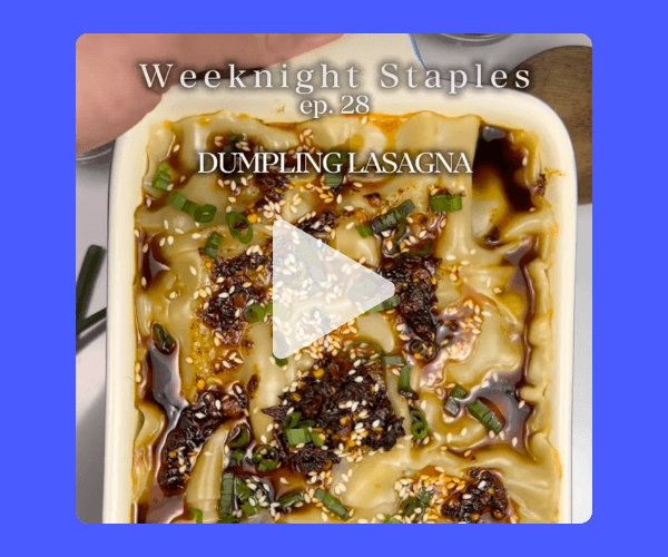 A close-up of a baked dish labeled “Weeknight Staples ep. 28: Dumpling Lasagna” shows dumplings topped with sauce, sesame seeds, and green onions. A play button overlay indicates a cooking video.