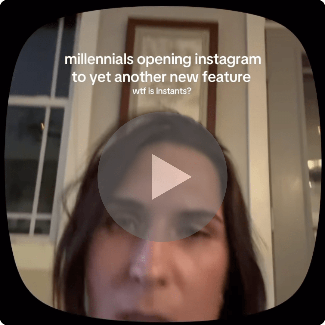 A video thumbnail shows a woman looking confused with text joking about millennials opening Instagram to another new feature. A large play button overlays the center of the image.