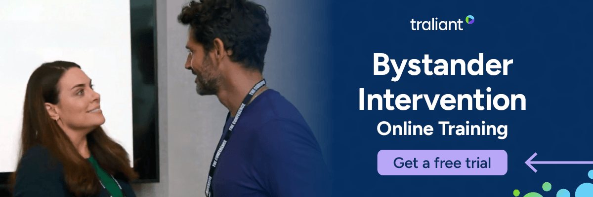 A promotional banner for Bystander Intervention Online Training shows two coworkers talking on the left against a dark blue background. The text includes a purple "Get a free trial" button and the Traliant logo.