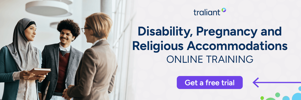 A promotional banner for Traliant advertises online training on disability, pregnancy, and religious accommodations. Three professionals are shown talking in a bright office setting beside a purple "Get a free trial" button.
