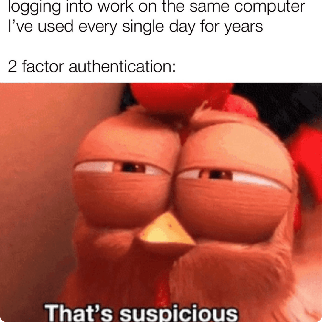 A meme shows text about logging into work on the same computer every day followed by "2 factor authentication:" above a close-up of a suspicious-looking animated character with narrowed eyes. The caption at the bottom reads, "That's suspicious.”