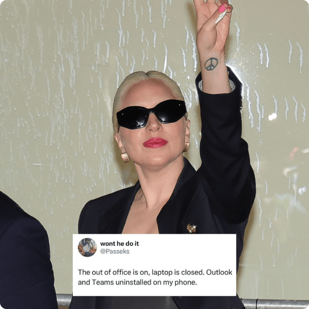 A woman wearing black sunglasses and a dark blazer raises one hand while posing in front of a light-colored wall. An overlaid social media post reads, "The out of office is on, laptop is closed. Outlook and Teams uninstalled on my phone.”