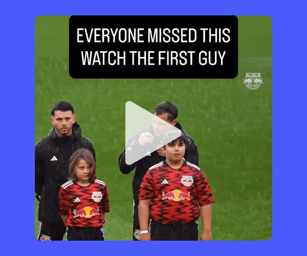 A video thumbnail shows soccer players and children standing on the field before a match in rainy weather. The text overlay reads, āEveryone missed this. Watch the first guy.ā