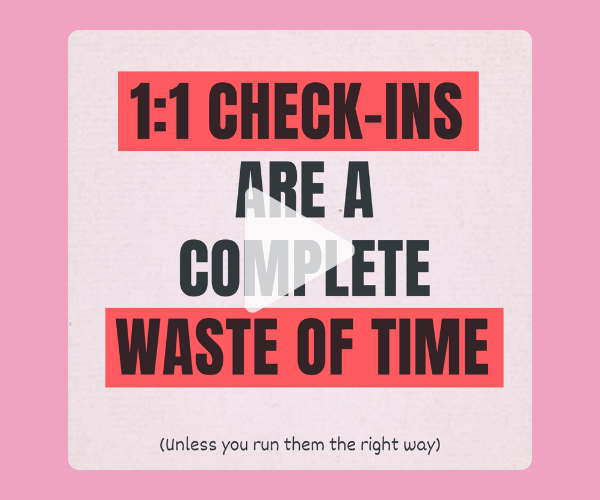 A video thumbnail on a pink background reads, “1:1 CHECK-INS ARE A COMPLETE WASTE OF TIME,” with smaller text below saying, “(Unless you run them the right way).” A translucent play button appears in the center.