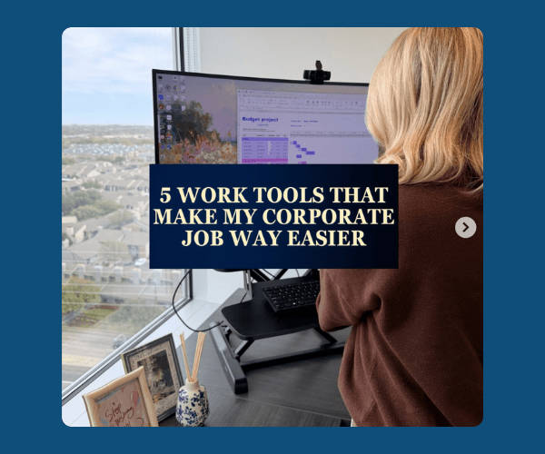 A woman with blonde hair stands at a desk facing a large computer monitor beside a window. A dark blue text box reads “5 WORK TOOLS THAT MAKE MY CORPORATE JOB WAY EASIER,” with a blue border surrounding the image.