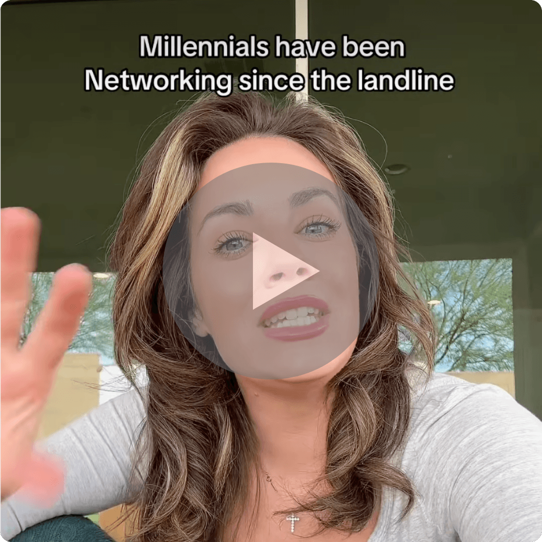 A woman with long brown hair, wearing a light gray top and a cross necklace, appears in a video thumbnail with one hand raised. White text outlined in black at the top reads, “Millennials have been Networking since the landline,” with a large translucent play button in the center.