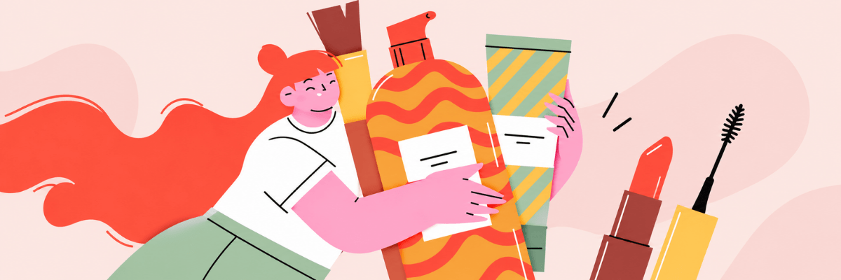 A colorful illustration features a woman with long red hair holding several oversized cosmetic products. Lipstick, mascara, and brightly patterned tubes appear against a light pink background with abstract shapes.